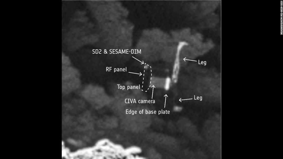 The image is detailed enough that viewers can pick out features of Philae&#39;s 3-foot-wide (1 meter) body. Even two of its three legs can be seen. 