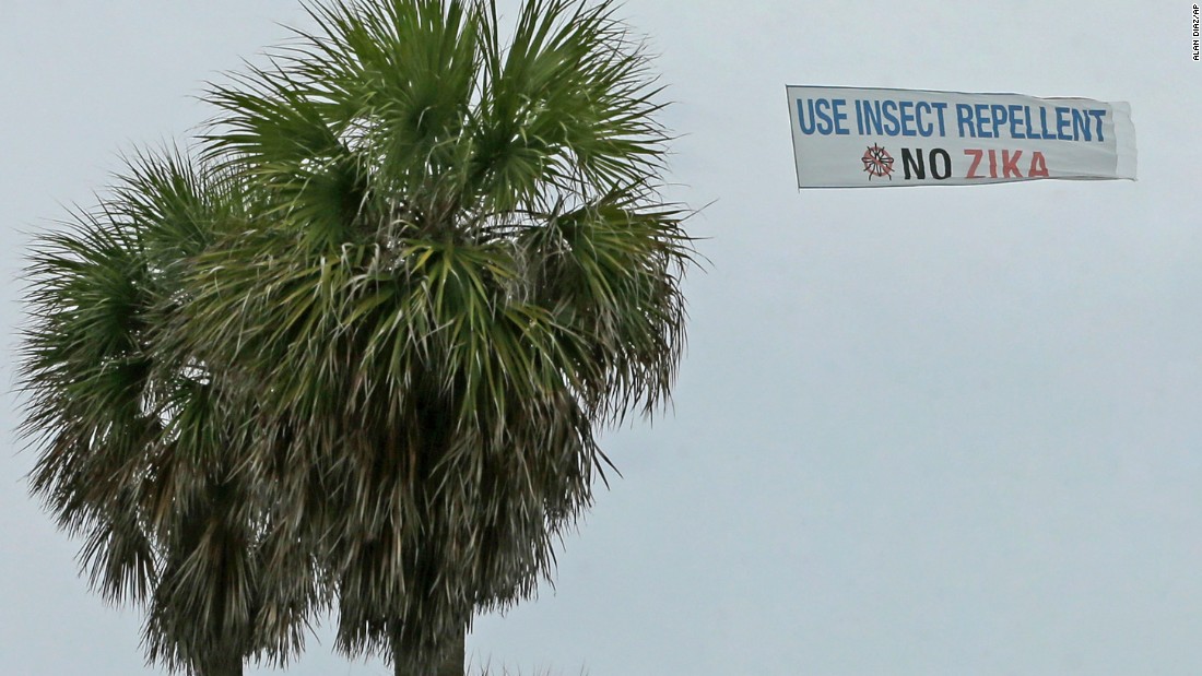 A banner is flown over the South Pointe Park area, Tuesday, September 6, in Miami Beach, Florida. 