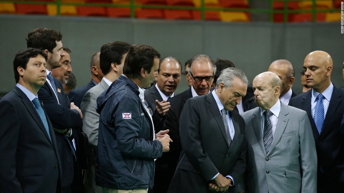 Brazil&#39;s interim President Michel Temer, center right, meets with officials during Temer&#39;s first visit to the Olympic Park on Thursday, June 14, in Rio de Janeiro. The Rio 2016 Olympic Games commence August 5 amid a political and economic crisis in the country along with the Zika virus outbreak.  