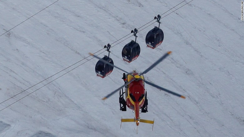 Dozens stuck overnight on cable cars in French Alps