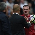 Wayne Rooney and Manchester City&#39;s Spanish manager Pep Guardiola clash 