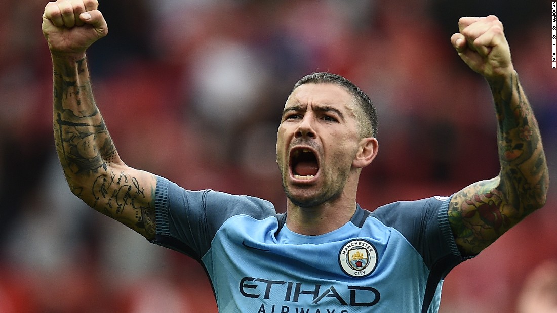 Manchester City&#39;s Serbian defender Aleksandar Kolarov celebrates on the pitch after the English Premier League football match between Manchester United and Manchester City at Old Trafford in Manchester, north west England, on September 10, 2016.