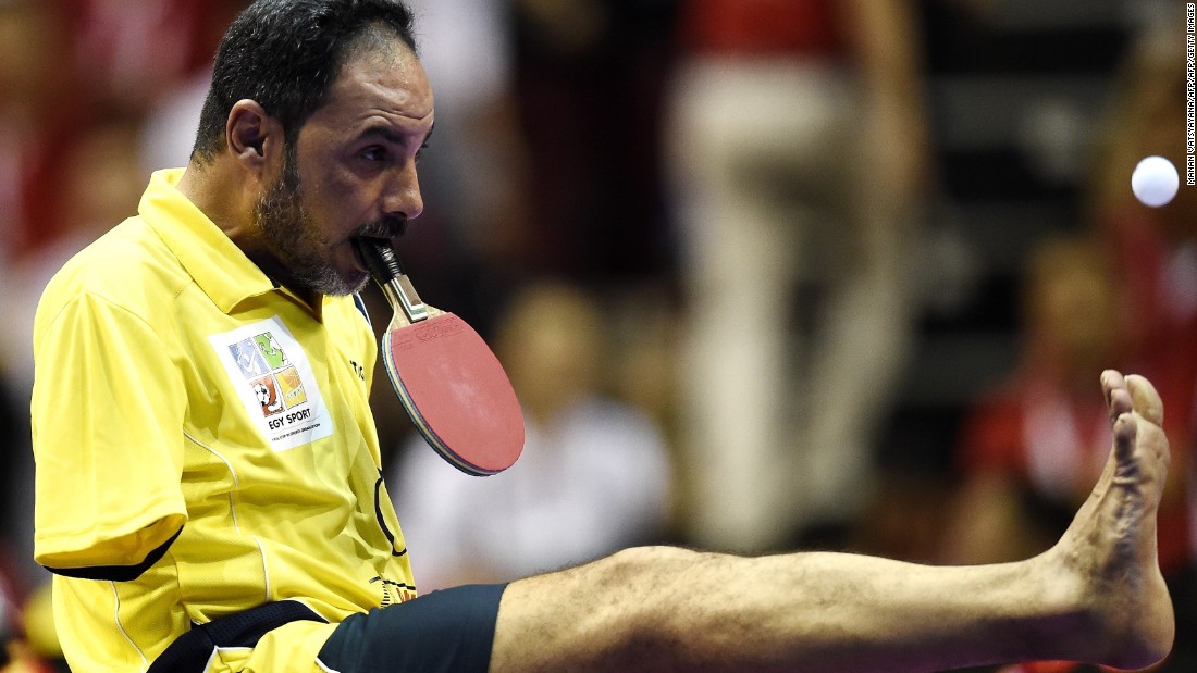  Ibrahim Hamato -- pictured at the 2016 World Team Table Tennis Championships -- came up with an ingenious way to continue playing table tennis after losing both his arms in an accident as a child.