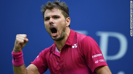 Wawrinka reacts after winning a set against  Djokovic during the US Open final.