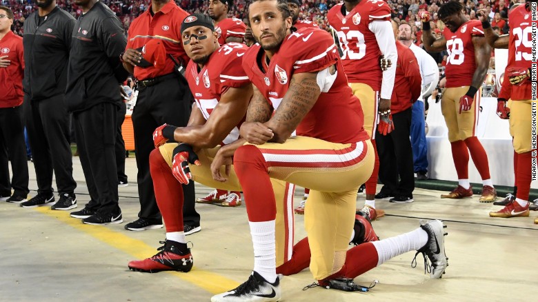 SANTA CLARA, CA - SEPTEMBER 12:  Colin Kaepernick #7 and Eric Reid #35 of the San Francisco 49ers kneel in protest during the national anthem prior to playing the Los Angeles Rams in their NFL game at Levi's Stadium on September 12, 2016 in Santa Clara, California.  (Photo by Thearon W. Henderson/Getty Images)