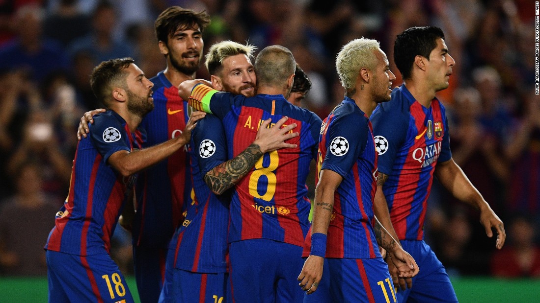 Lionel Messi celebrates one of his three goals as Barcelona recorded its largest Champions League victory when thrashing Celtic 7-0 at Camp Nou. 