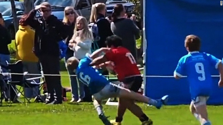Watch boy plow through rugby rivals