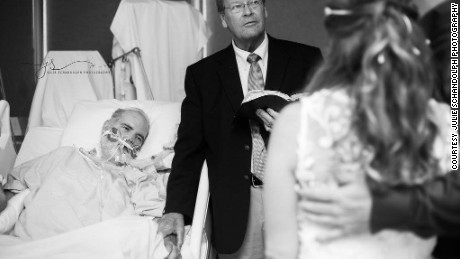 Steve Hammonds witnesses his daughter&#39;s wedding ceremony from his hospital bed.