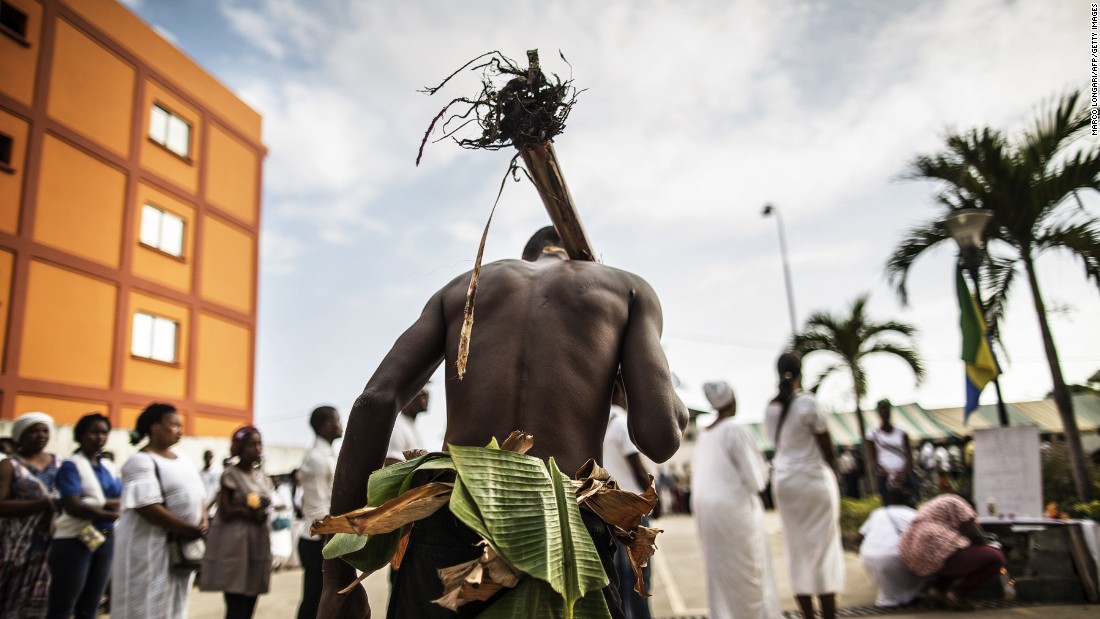 The unrest resulted in deadly violence, arrests and media black outs. Here,&lt;br /&gt;a man traditionally dressed with banana leaves joins mourners paying their respects at an altar for those who died. &lt;br /&gt;