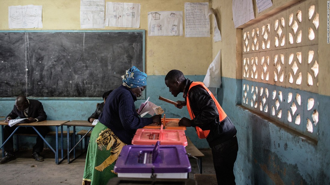 Zambians also went to the polls in August for their general elections. Pictured here, a Zambian woman casts her ballot at a polling station in a school.