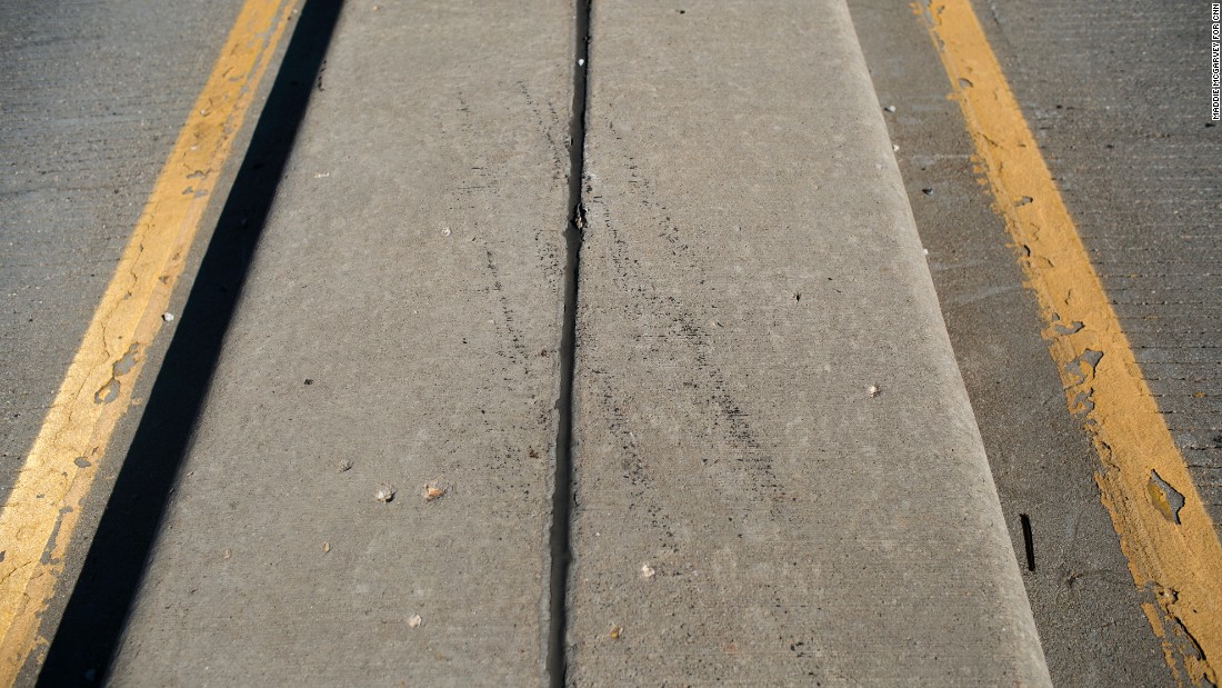 &lt;strong&gt;The highway: &lt;/strong&gt;Police say the heroin epidemic in Huntington, West Virginia, has left virtually no place in town untouched. Here, tire marks remain on a concrete median where a car crashed near a bridge on August 15. The 21-year-old driver overdosed with her engine still running.