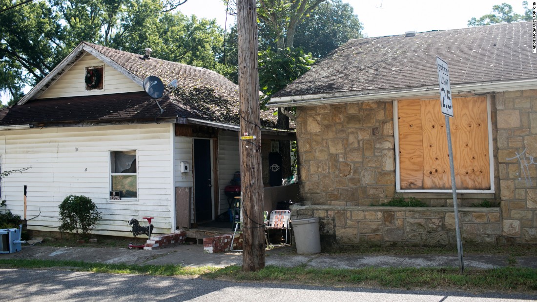 &lt;strong&gt;A home: &lt;/strong&gt;Paramedics responded to the house on the left, where they said children&#39;s toys dotted the living room floor as they tended to a 28-year-old woman.