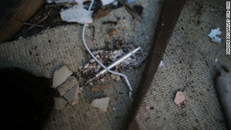 A dirty needle lies on the ground in Huntington.