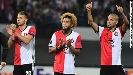 Bart Nieuwkoop, goalscorer Tonny Trindade and Karim El Ahmadi celebrate Feyenoord&#39;s win. 