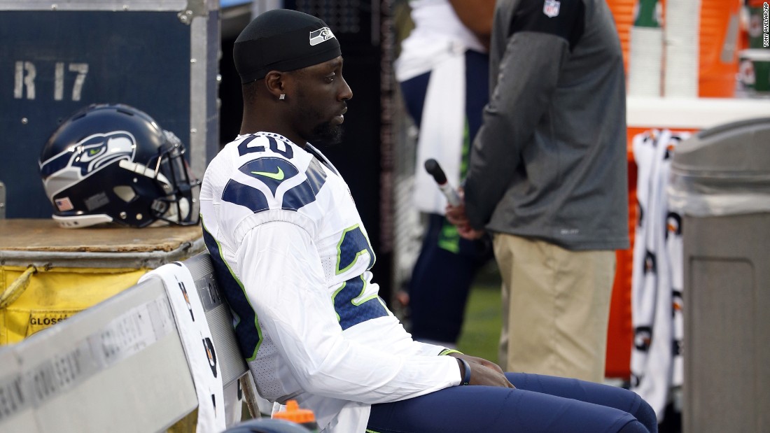 Seattle Seahawks&#39; Jeremy Lane sits as the national anthem plays before a preseason match against the Oakland Raiders on September 1, 2016, in Oakland.