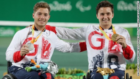 Gordon Reid and Alfie Hewett celebrate with their medals after the singles final.