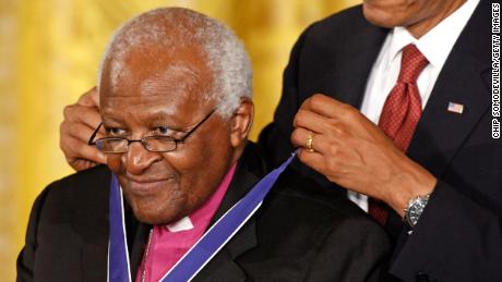 WASHINGTON - AUGUST 12: U.S. President Barack Obama (R) presents the Medal of Freedom to Bishop Desmond Tutu during a ceremony in the East Room of the White House August 12, 2009 in Washington, DC. Obama presented the medal, the highest civilian honor in the United States, to 16 recipients during the ceremony. (Photo by Chip Somodevilla/Getty Images)