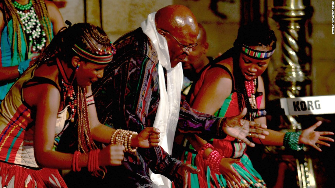 Tutu dances at the launch of his biography &quot;Tutu: The Authorised Portrait&quot; in 2011.