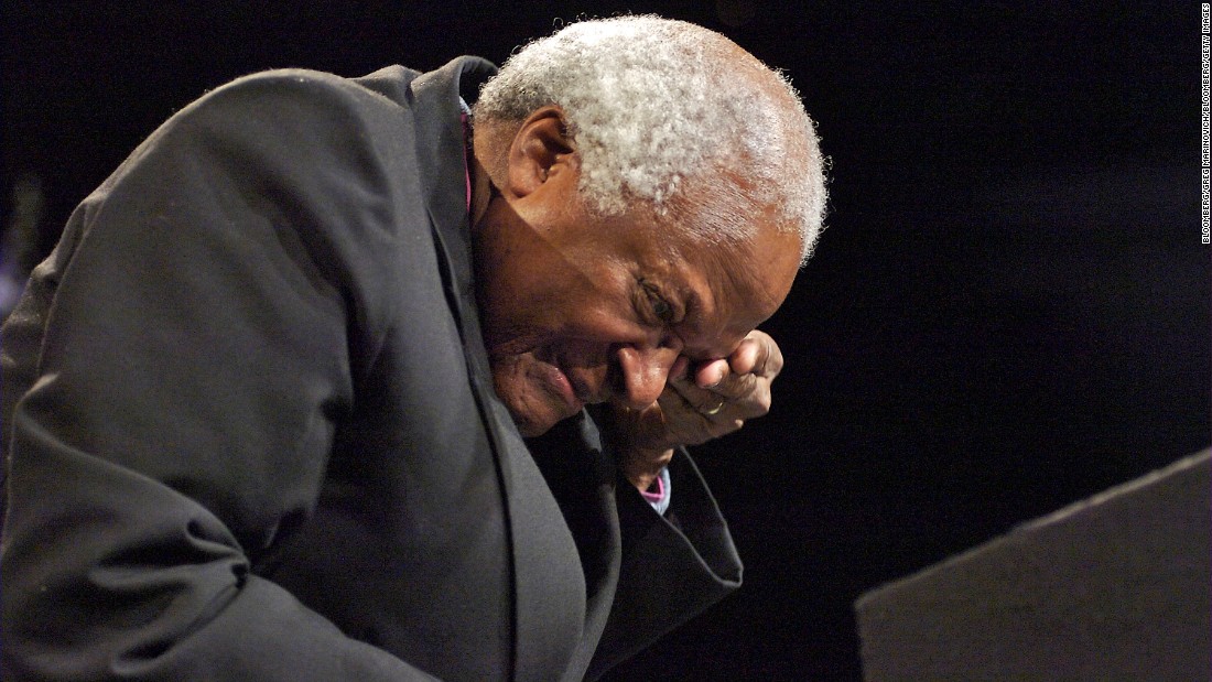 Tutu wipes away tears after hearing Peter Gabriel sing &quot;Biko&quot; in Johannesburg in 2007. The song is about the death of anti-apartheid activist Steve Biko.