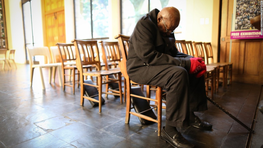 Tutu prays during a vigil in Cape Town for the victims of a mass shooting in Orlando in 2016.