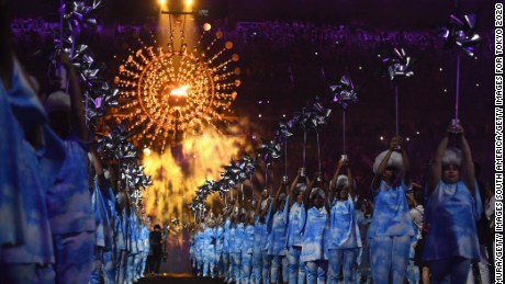 Sunday&#39;s closing ceremony was a joyful extravaganza of music and dance, tinged with sadness.