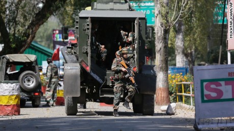 Indian army soldiers arrive at the army base which was attacked by suspected rebels in the town of Uri, west of Srinagar, Indian-controlled Kashmir, on Sunday, Sept. 18, 2016.