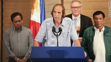 Freed Norwegian hostage Kjartan Sekkingstad speaks at a press conference with Philippines President Rodrigo Duterte. 