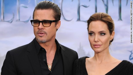 Brad Pitt and Angelina Jolie attend a private reception as costumes and props from Disney's "Maleficent" are exhibited in support of Great Ormond Street Hospital at Kensington Palace on May 8, 2014 in London, England.  