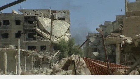 A walk through damage in Darayya, Syria