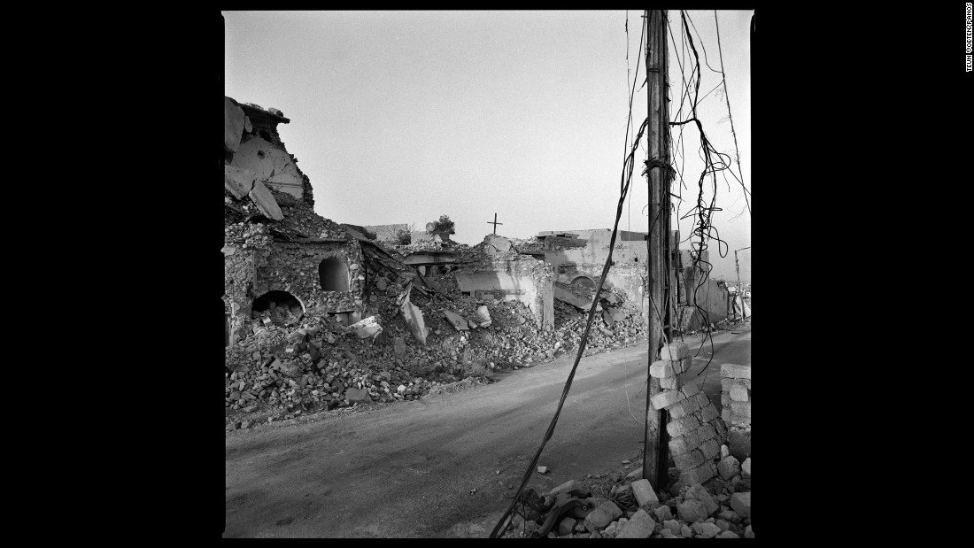 Destroyed buildings line a street in Sinjar, Iraq. The town was taken over by the ISIS militant group in August 2014. It was liberated in 2015, but it no longer looks the same.