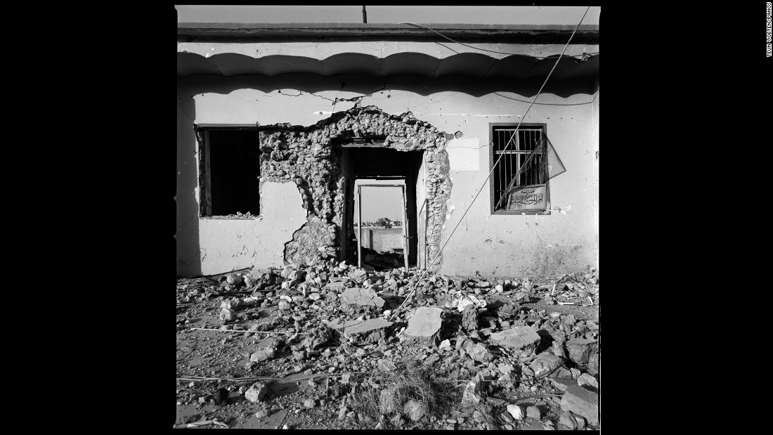 The entrance to a heavily damaged house in Sinjar. Voeten has covered wars for about 25 years, but he said this was &quot;destruction on a scale I have rarely witnessed before.&quot;