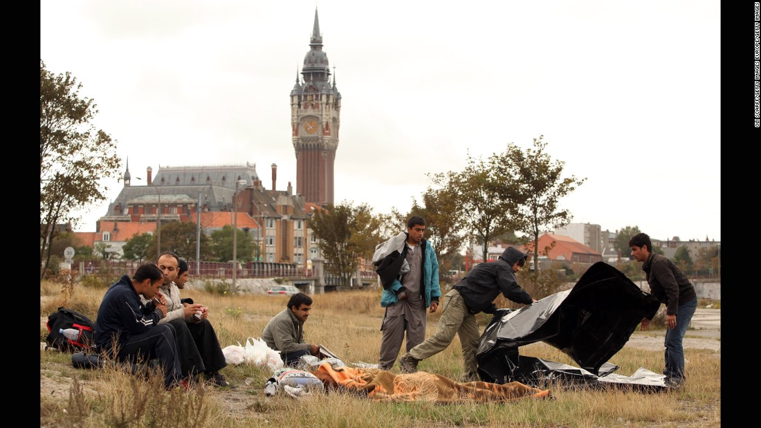 Displaced from &quot;The Jungle&quot; camp, Afghan migrants congregate in Calais&#39; harbor in September 2009.