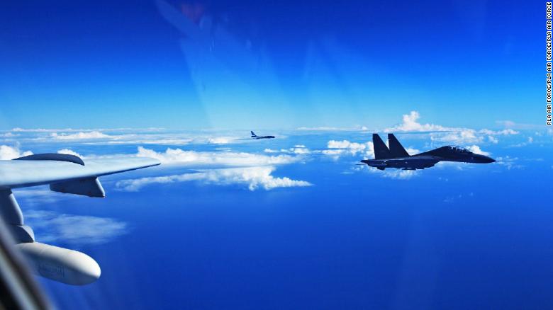 Chinese SU-30 fighters fly over the Pacific in 2016.