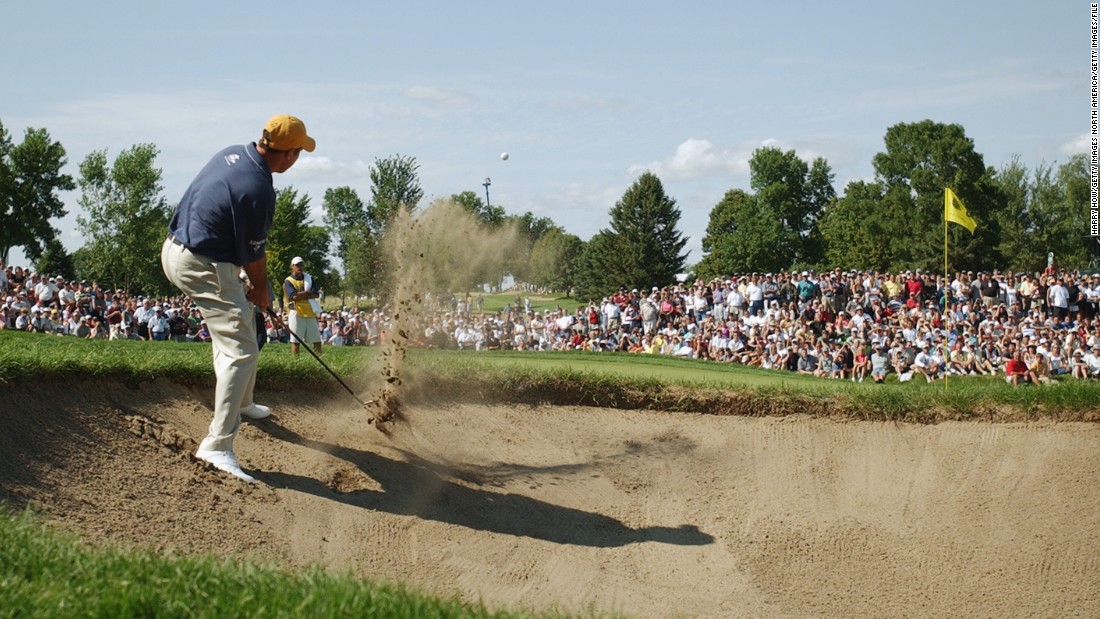 That year Rich Beem -- pictured hitting out of the bunker at hole No. 8 -- was a surprise champion, with Tiger Woods runner-up. It would be Beem&#39;s only major title. 