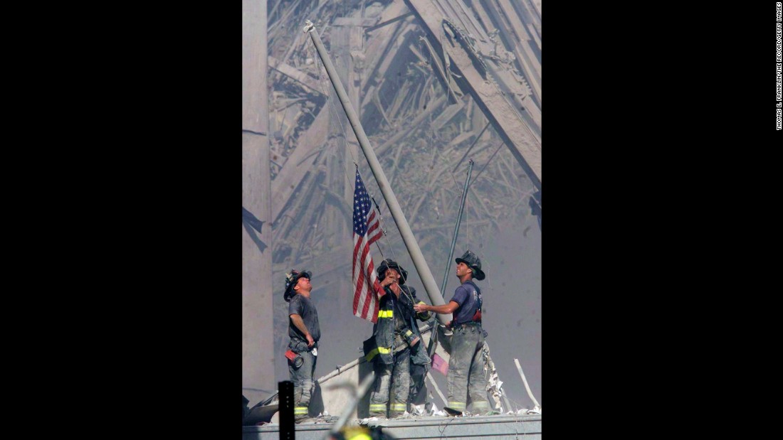 Firefighters George Johnson, Dan McWilliams and Billy Eisengrein raise a flag at the site of the World Trade Center in New York after the terror attacks on September 11, 2001. The scene was immortalized by photographer Thomas E. Franklin and has been compared to the iconic image of the flag-raising at Iwo Jima. &lt;a href=&quot;http://www.cnn.com/SPECIALS/us/cnn-films-the-flag/index.html&quot;&gt;CNN Films&#39; &quot;The Flag&quot;&lt;/a&gt; examines what happened to the flag at ground zero and explores its impact in the aftermath of the tragedy.