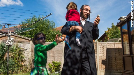 An orthodox Jewish community is leaving their overcrowded, north London neighborhood to put down new roots in rural, flood-prone Canvey Island, where the Thames River meets the sea.