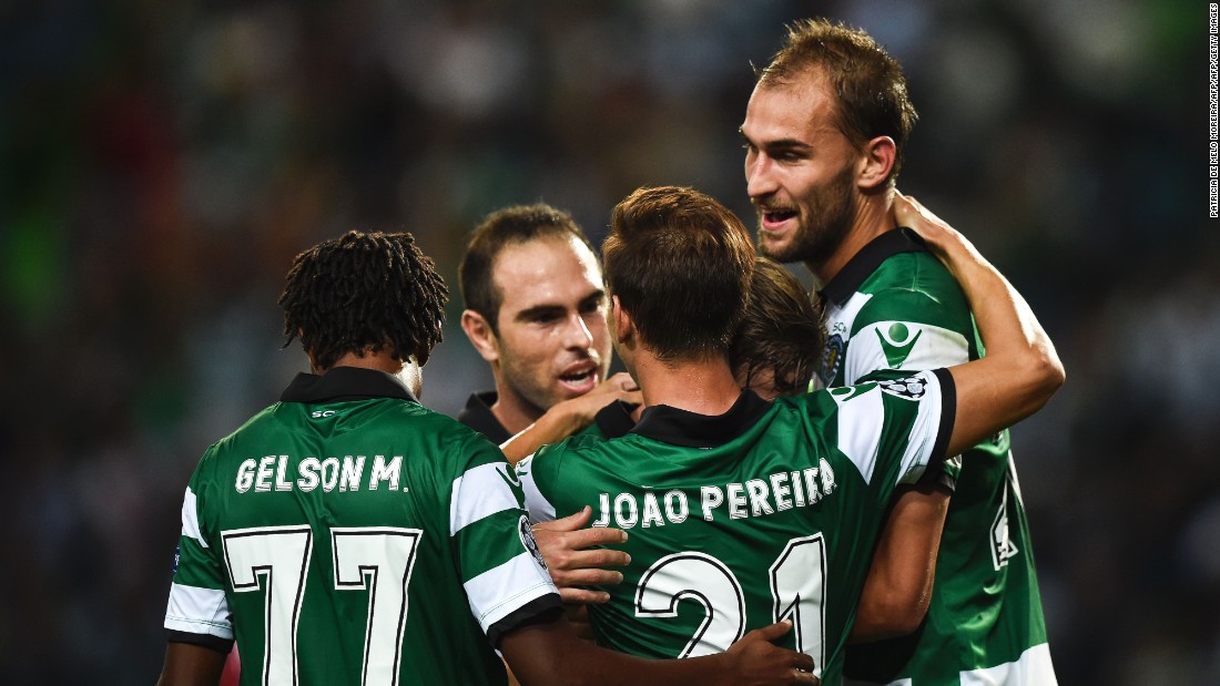 Sporting&#39;s Dutch forward Bas Dost scored his side&#39;s second in the 2-0 win over Legia Warsaw in Lisbon.