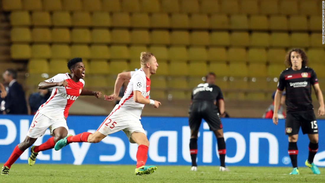 Kamil Glik celebrates after smashing home a late equaliser in  Monaco&#39;s Champions League game against Bayer Leverkusen, but only 8,100 fans attended the game.