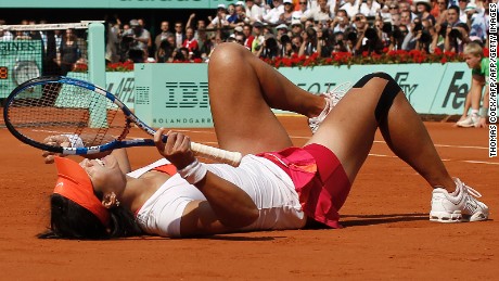 Li Na collapses in delight after winning the French Open in 2011.