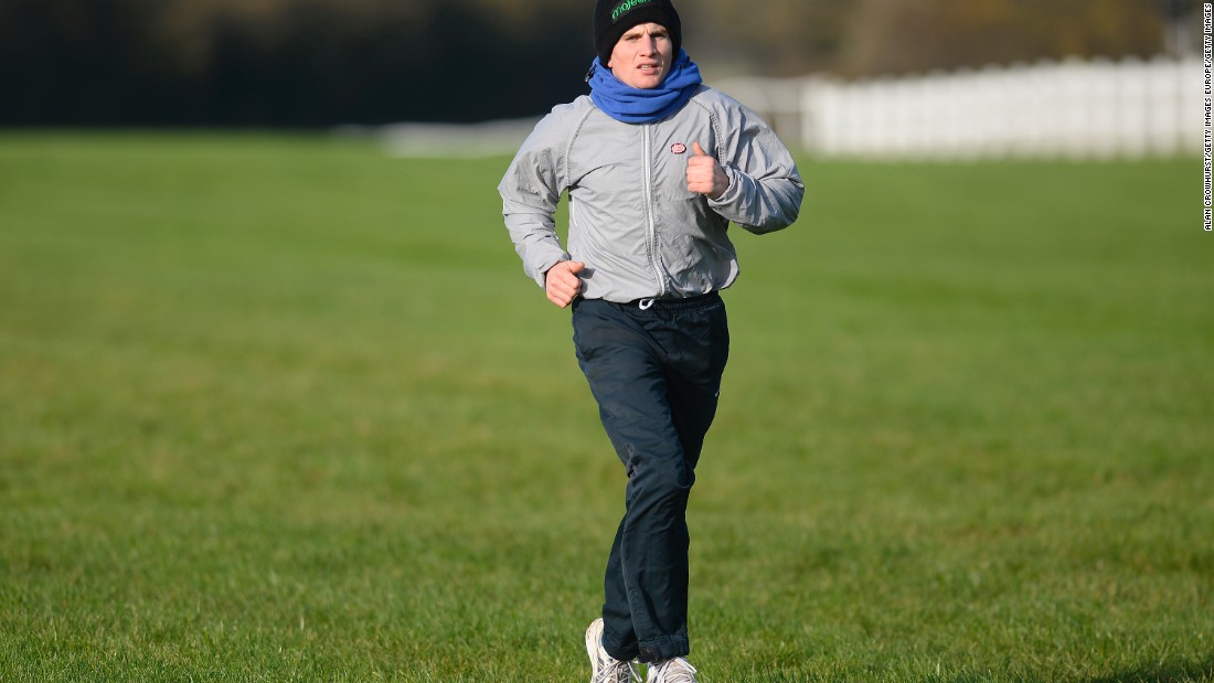 The fitness of jockeys has changed dramatically over the years. Here National Hunt jockey Jamie Moore jogs around Wincanton racecourse before a race in 2014.
