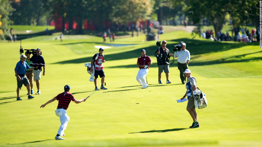 Jordan Spieth and Patrick Reed of the United States celebrate Patrick&#39;s shot on the sixth hole during the fourball matches for the 41st Ryder Cup at Hazeltine National Golf Course on October 1.