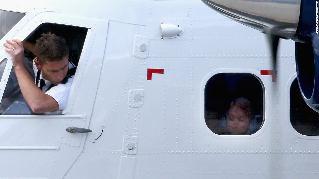 Prince George of Cambridge looks out of the window of a sea-plane in Victoria on October 1.