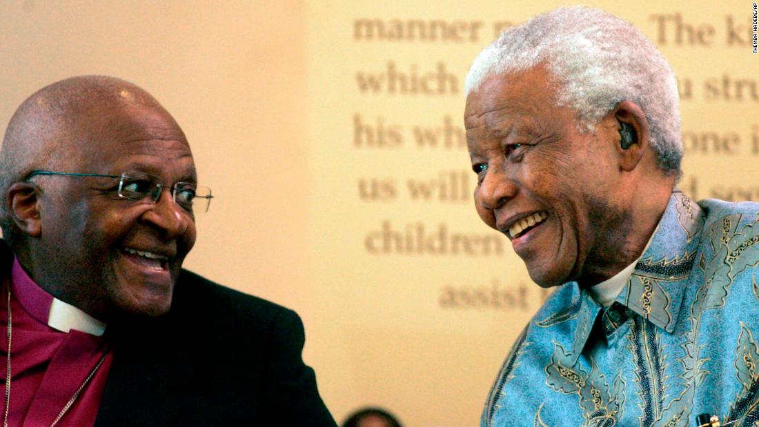 Tutu talks with Mandela at an event in Johannesburg in 2008.