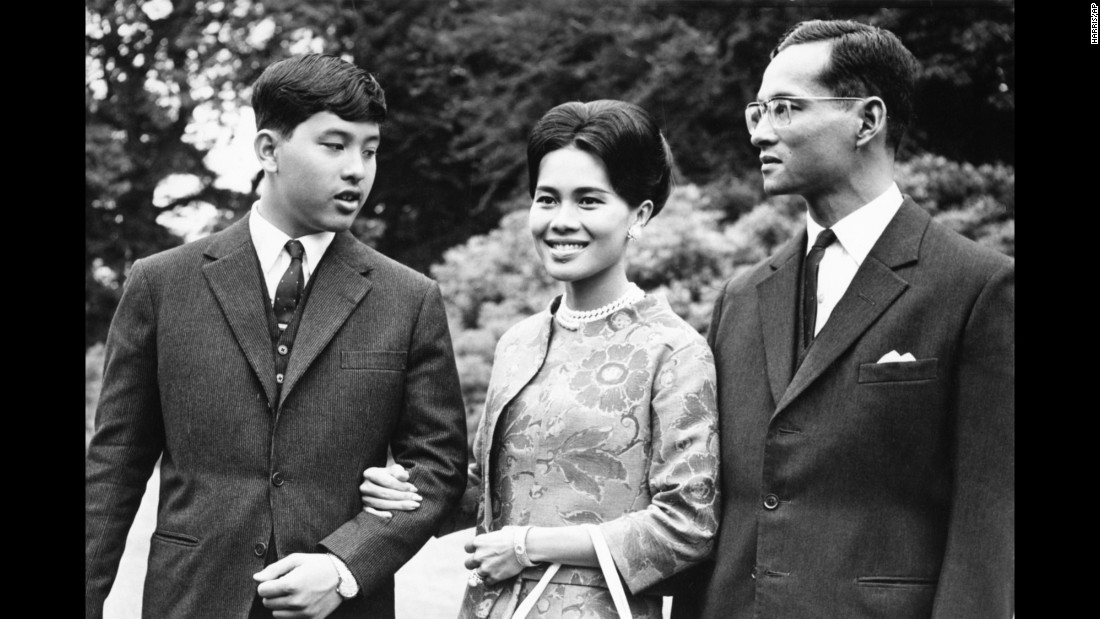 The King walks with his wife and their 13-year-old son, Crown Prince Vajiralongkorn, during a visit to Britain in 1966.