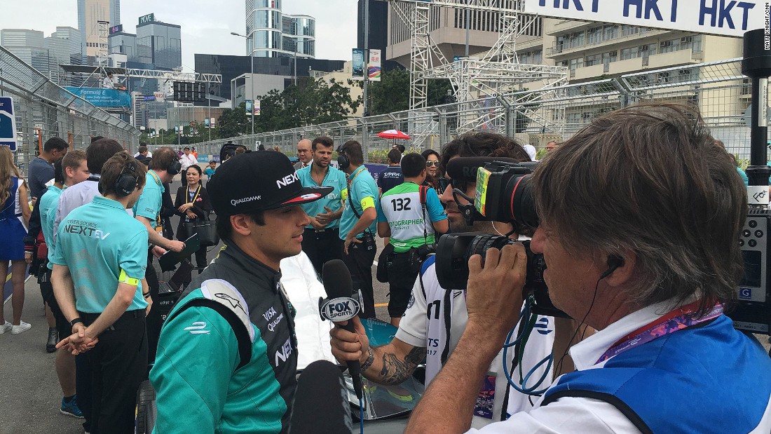 Polesitter Nelson Piquet Jr talking to the media on the grid ahead of Sunday&#39;s race.