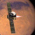 Artist&#39;s impression visualising the ExoMars 2016 Trace Gas Orbiter (TGO), with its thrusters firing, beginning its entry into Mars orbit on 19 October 2016