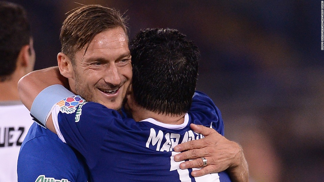 Totti (left) confessed after the game that he can now retire happy having played with Maradona. The Roma veteran was assisted by Maradona for his first half goal. 