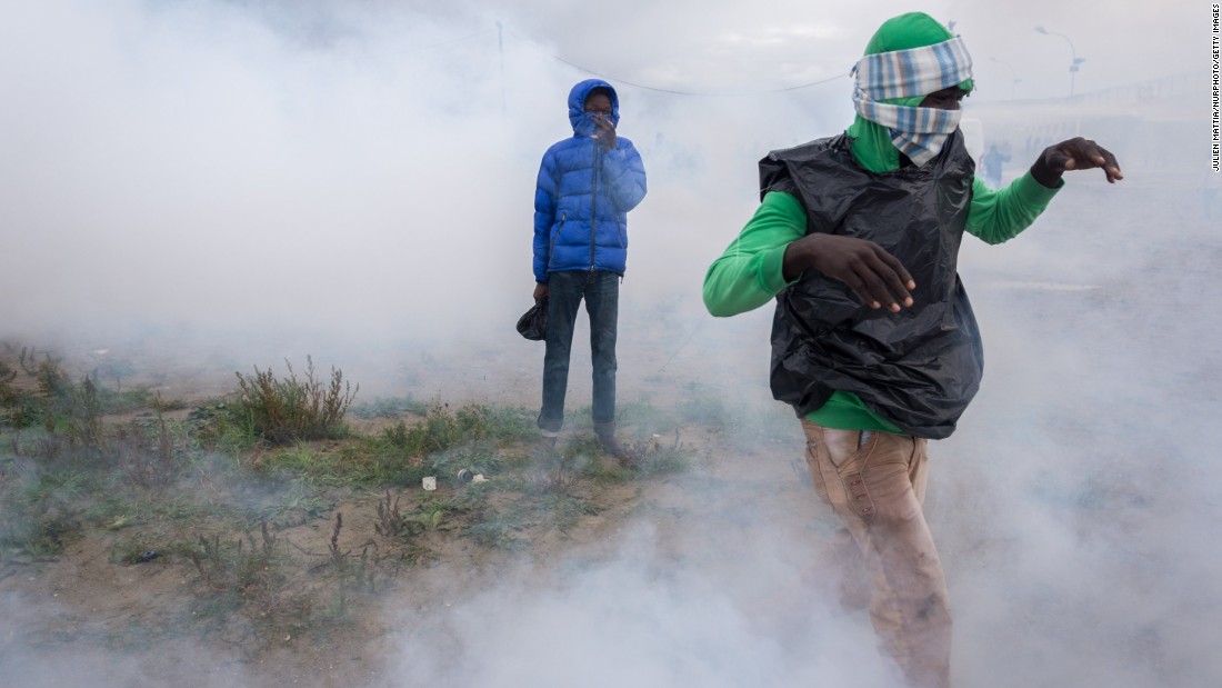 Refugees in Calais claimed their rights to pass to Great Britain but were pushed back by tear gas and flash grenades on Saturday, October 1. 