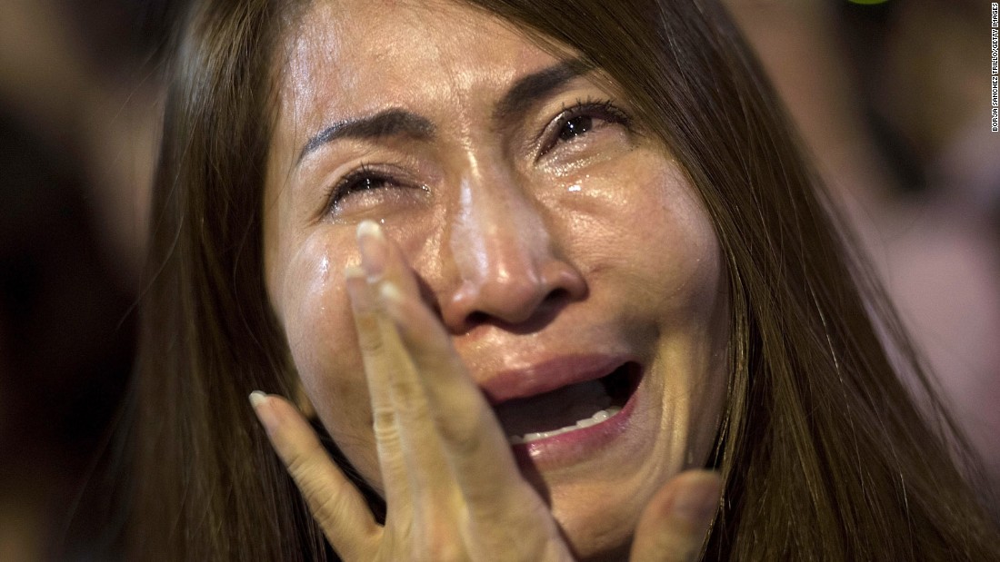 A women cries after learning of the King&#39;s death on October 13 in Bangkok.