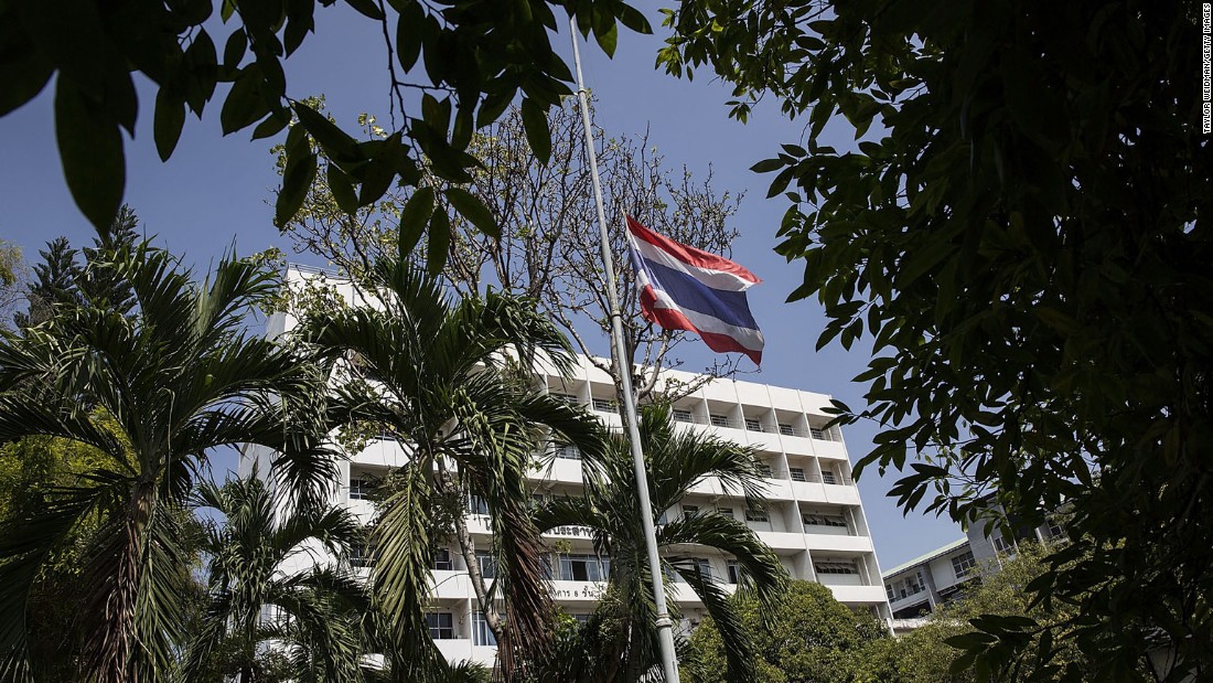 A flag flies at half-staff outside a government hospital on October 14 in Chiang Mai, Thailand. According to a palace statement, all government buildings will fly the Thai flag at half-staff for 30 days starting on Friday.